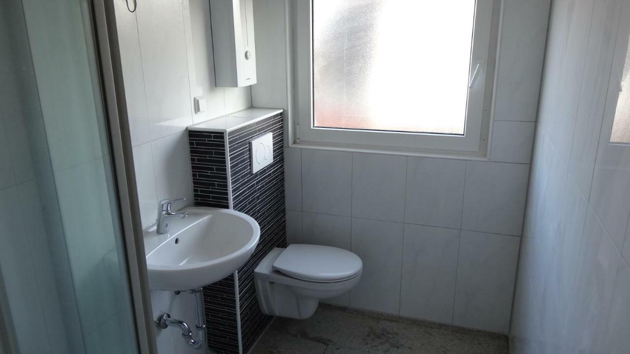 Huus Veertein Apartment นอยฮาร์ลิงเงอซีล ภายนอก รูปภาพ